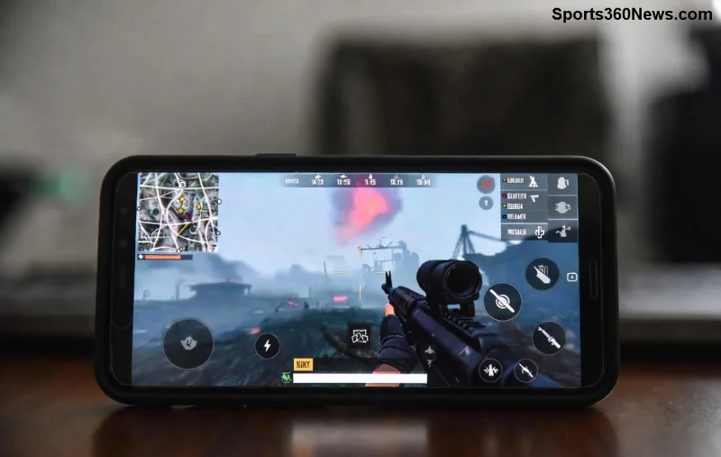 لاعب محترف يلعب PUBG على آيباد مع إكسسوارات